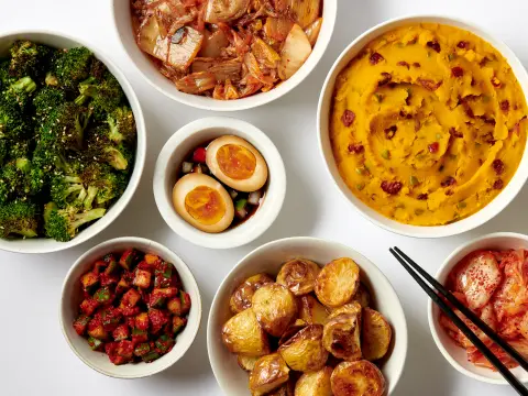 Korean banchan side dish trays for catering from Sopo Korean Eats
