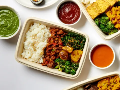 Variety of Korean signature plates — beef, pork, chicken, steak, and tofu — from Sopo Korean Eats