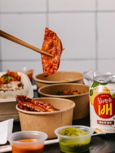 Sopo Korean Eats’ scallion dumpling, paired with sauces and Korean pear drink.