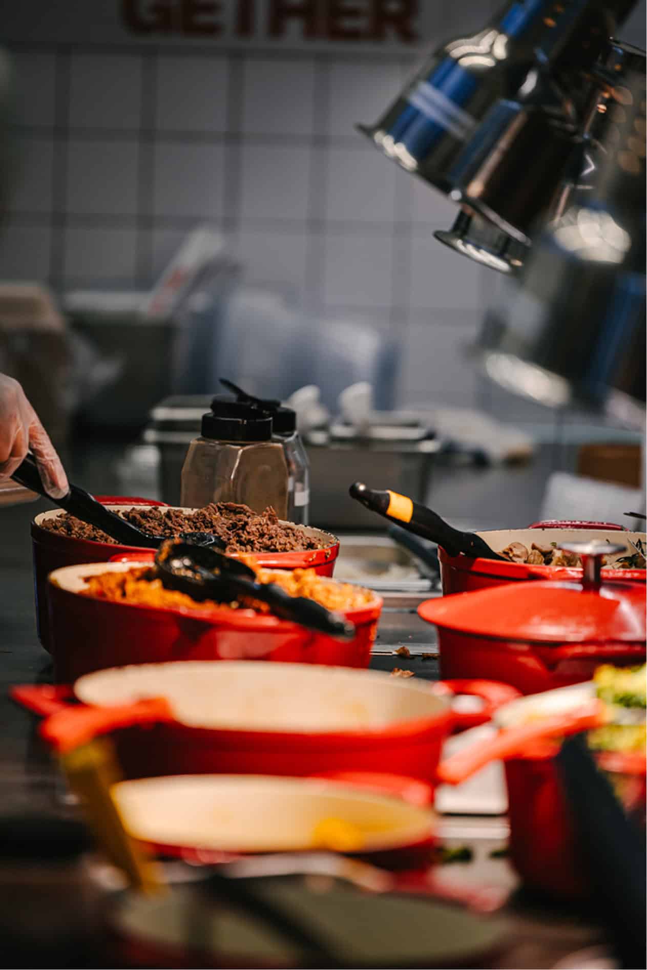 Korean lunch delivery from Sopo Korean Eats: a build-your-own plate with bulgogi, kimbap, and sides at a Midtown desk